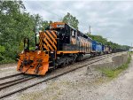 WE 7025 has shoved the empties into Rock Cut Siding.